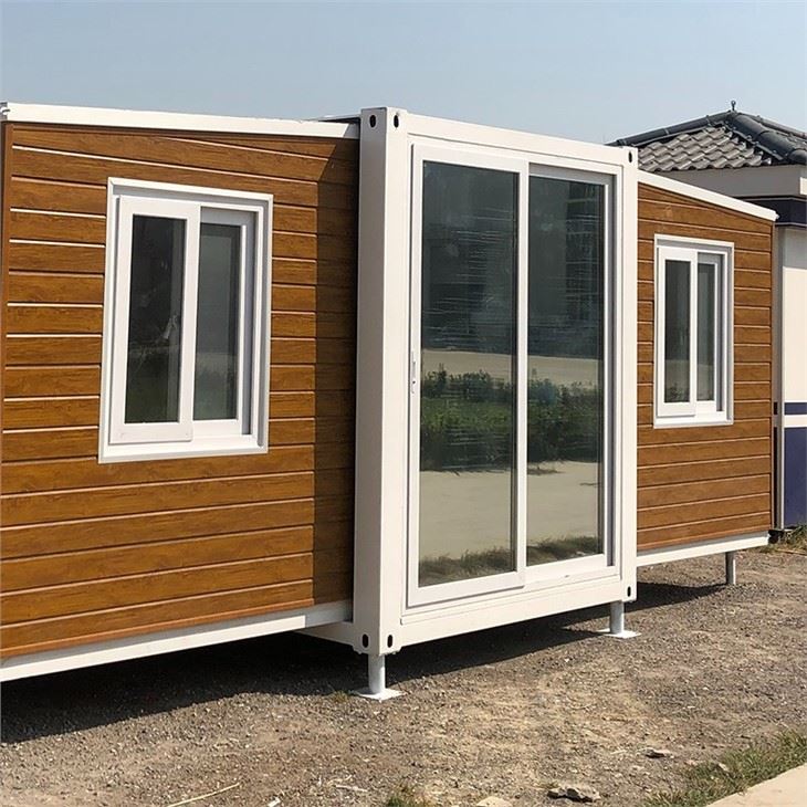 expandable container house with external cladding